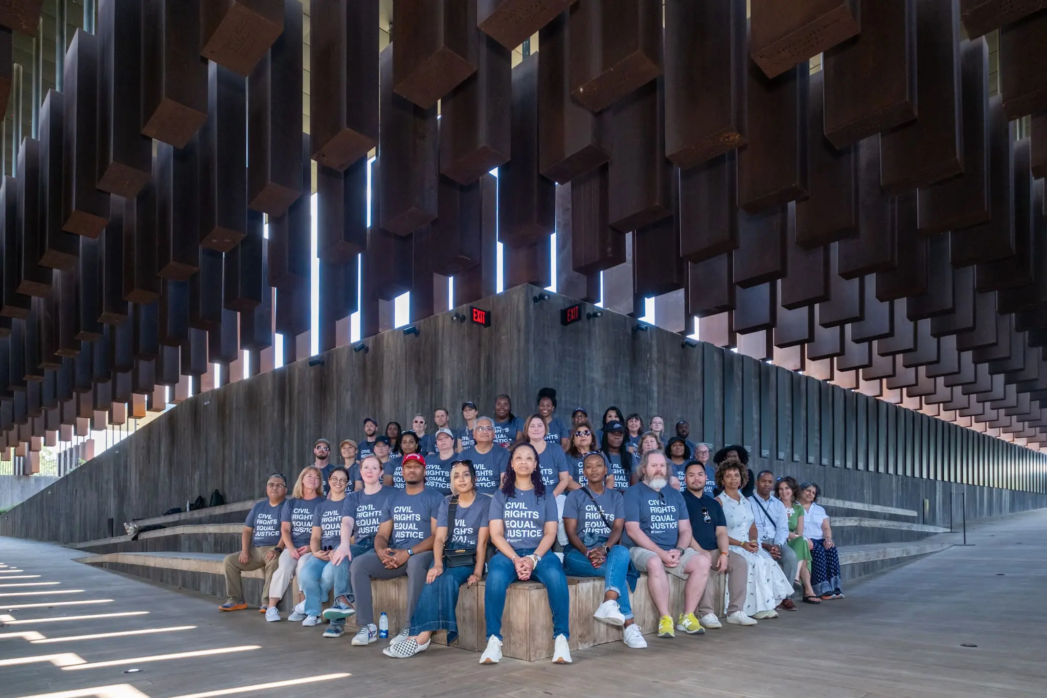 Group picture of the Health Forward staff and the Proinspire team in Montgomery, Alabama at the National Memorial for Peace and Justice