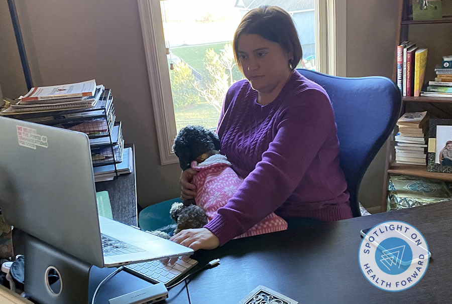 Jennifer and her dog Larry working at home